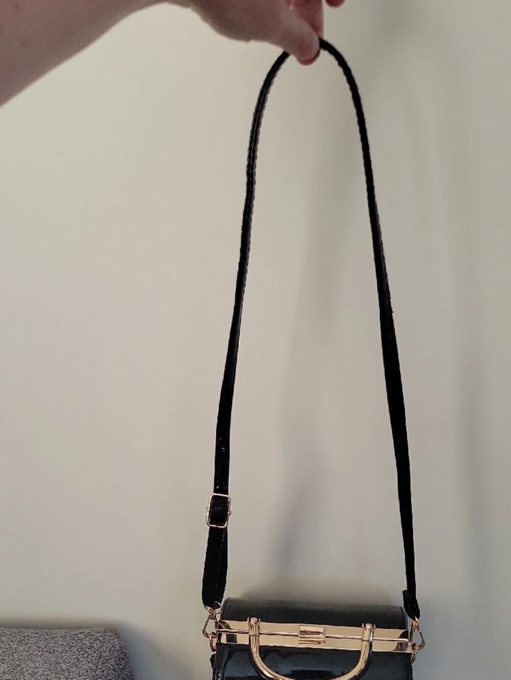 Vintage Sleek Black Patent Barrel Crossbody Bag with Gold Hardware
